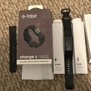 Fitbit charge 5 with charger and extra band
